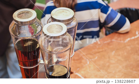 Glass jars holding refreshing liquids, providing options at a hospitality venue Glass jars holding refreshing liquids, providing options at a hospitality venue 138228607