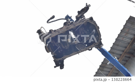Vehicle engine block on stand during maintenance 138228664