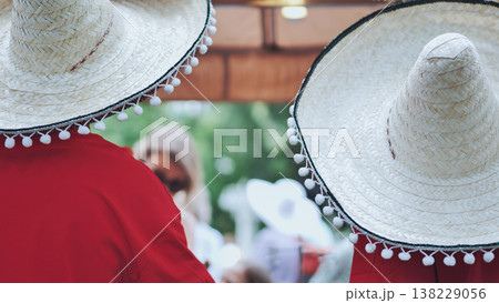 Sombreros celebrating Mexican culture and traditions at a festive outdoor event Sombreros celebrating Mexican culture and traditions at a festive outdoor event 138229056