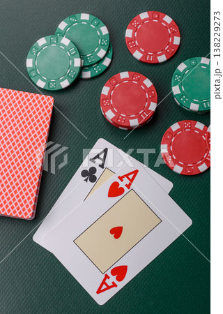 Casino, cards and chips on a colored background, poker and blackjack, gambling. Cards and chips Casino, cards and chips on a colored background, poker and blackjack, gambling. Cards and chips 138229273