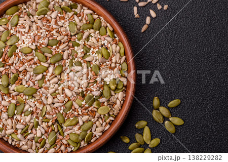 Shelled sunflower, sesame, pumpkin, and flaxseed kernels as ingredients for healthy food 138229282