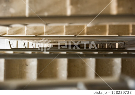 Looking down a modern staircase, creating a deep symmetrical perspective Looking down a modern staircase, creating a deep symmetrical perspective 138229728