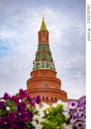 Vodovzvodnaya Tower, Moscow Kremlin, with petunias in front, Russian landmark Vodovzvodnaya Tower, Moscow Kremlin, with petunias in front, Russian landmark 138229765