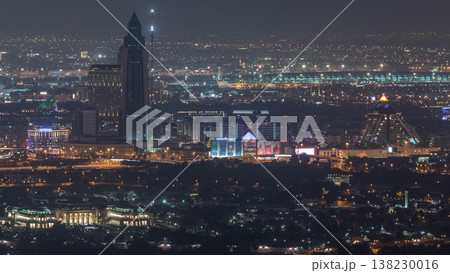 Aerial view of neighborhood Deira and Dubai creek with typical old and modern buildings night timelapse. Aerial view of neighborhood Deira and Dubai creek with typical old and modern buildings night timelapse. 138230016