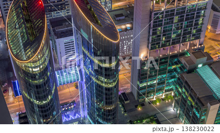 Skyline of the buildings of Sheikh Zayed Road and DIFC aerial night timelapse in Dubai, UAE. 138230022