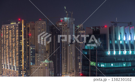 Rooftop view on amazing Dubai marina and JLT skyscrapers aerial timelapse, Dubai, United Arab Emirates Rooftop view on amazing Dubai marina and JLT skyscrapers aerial timelapse, Dubai, United Arab Emirates 138230102