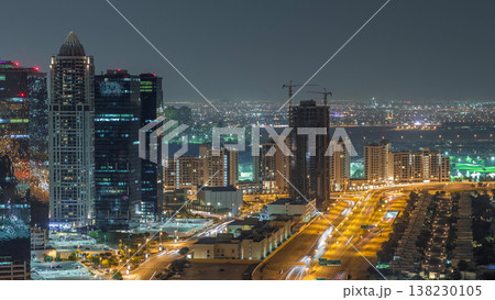 Jumeirah Lake Towers residential district aerial night timelapse near Dubai Marina 138230105