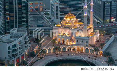 Modern residential architecture of Dubai Marina and Mohammed Bin Ahmed Almulla Mosque aerial day to night timelapse Modern residential architecture of Dubai Marina and Mohammed Bin Ahmed Almulla Mosque aerial day to night timelapse 138230133
