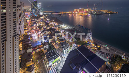 Waterfront overview Jumeirah Beach Residence JBR skyline aerial day to night timelapse with yacht and boats Waterfront overview Jumeirah Beach Residence JBR skyline aerial day to night timelapse with yacht and boats 138230189