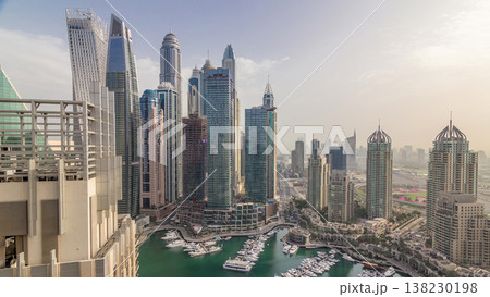 Aerial top view of Dubai Marina morning timelapse. Modern towers and traffic on the road Aerial top view of Dubai Marina morning timelapse. Modern towers and traffic on the road 138230198