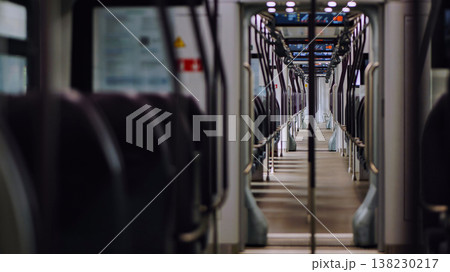 Empty modern train car showing seats and handles Empty modern train car showing seats and handles 138230217