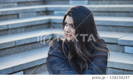 Young Indian woman posing on stairs in Moscow Young Indian woman posing on stairs in Moscow 138230247