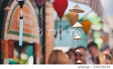 Traditional vietnamese conical hats hanging in a souvenir shop in Vietnam 138230259