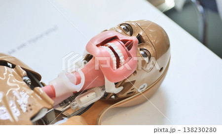 Medical training mannequin featuring open mouth for intubation simulation Medical training mannequin featuring open mouth for intubation simulation 138230280