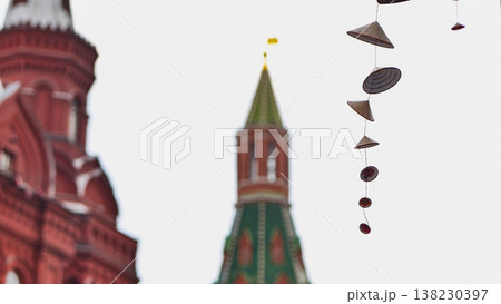 Vietnamese conical hats hanging with Moscow Kremlin in background Vietnamese conical hats hanging with Moscow Kremlin in background 138230397