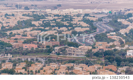 Aerial view of apartment houses and villas in Dubai city timelapse, United Arab Emirates 138230543