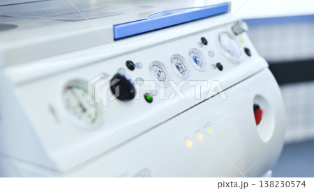 Ventilator panel showing gauges and controls, indicating critical care or intensive therapy 138230574