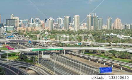 Dubai Golf Course with a cityscape of Greens and tecom districts at the background aerial timelapse Dubai Golf Course with a cityscape of Greens and tecom districts at the background aerial timelapse 138230630