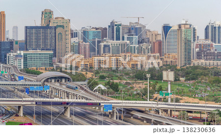 Dubai Golf Course with a cityscape of Greens and tecom districts at the background aerial timelapse 138230636