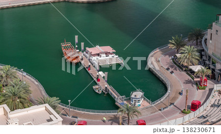 Waterfront promenade in Dubai Marina aerial timelapse. Dubai, United Arab Emirates Waterfront promenade in Dubai Marina aerial timelapse. Dubai, United Arab Emirates 138230671