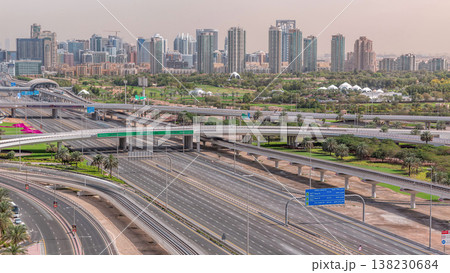 Dubai Golf Course with a cityscape of Greens and tecom districts at the background aerial timelapse Dubai Golf Course with a cityscape of Greens and tecom districts at the background aerial timelapse 138230684