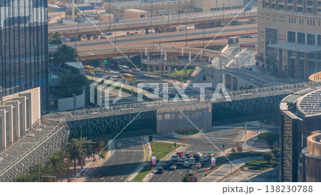 View of intersection with many transports in traffic Timelapse Aerial View of intersection with many transports in traffic Timelapse Aerial 138230788