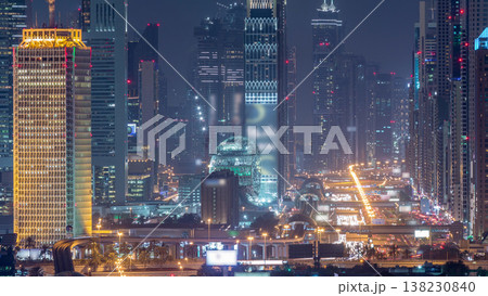 Dubai skyline with beautiful city center lights and Sheikh Zayed road traffic night timelapse, Dubai, United Arab Emirates Dubai skyline with beautiful city center lights and Sheikh Zayed road traffic night timelapse, Dubai, United Arab Emirates 138230840