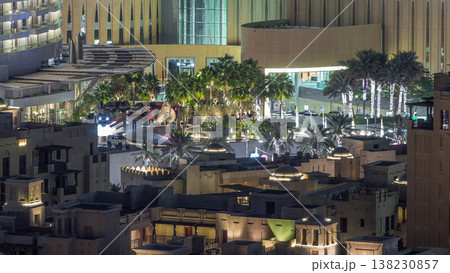 Top view of shopping mall entrance and parking area timelapse with traffic on the road. Top view of shopping mall entrance and parking area timelapse with traffic on the road. 138230857