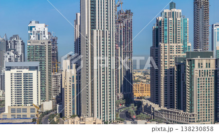 Beautiful skyline of Dubai downtown and Business bay with modern architecture. Beautiful skyline of Dubai downtown and Business bay with modern architecture. 138230858