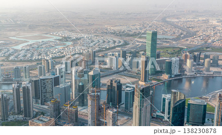 Downtown of Dubai in the morning timelapse after sunrise. Aerial view with towers and skyscrapers 138230878