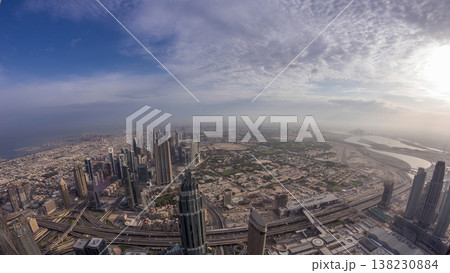 Downtown of Dubai in the morning timelapse after sunrise. Aerial view with towers and skyscrapers 138230884