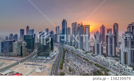 Modern residential and office complex with many towers aerial timelapse at Business Bay, Dubai, UAE. Modern residential and office complex with many towers aerial timelapse at Business Bay, Dubai, UAE. 138230979
