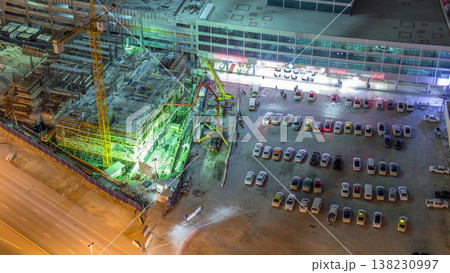 Aerial view of construction with special machines in Business Bay, Dubai timelapse 138230997