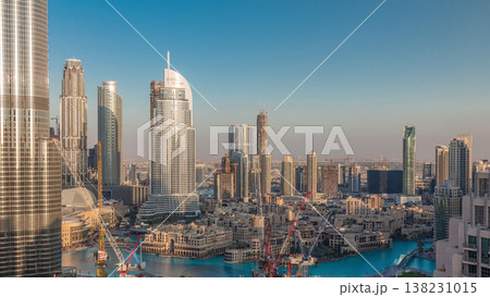 Amazing aerial view of Dubai downtown skyscrapers evening timelapse, Dubai, United Arab Emirates Amazing aerial view of Dubai downtown skyscrapers evening timelapse, Dubai, United Arab Emirates 138231015