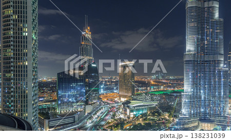 Amazing aerial view of Dubai downtown skyscrapers night timelapse, Dubai, United Arab Emirates Amazing aerial view of Dubai downtown skyscrapers night timelapse, Dubai, United Arab Emirates 138231039