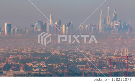 Dubai Marina and Jumeirah beach during sunrise with early morning fog timelapse in Dubai, United Arab Emirates Dubai Marina and Jumeirah beach during sunrise with early morning fog timelapse in Dubai, United Arab Emirates 138231077