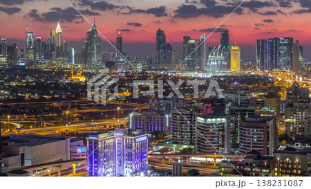 View of transition from day to night in Dubai city, United Arab Emirates Timelapse Aerial 138231087