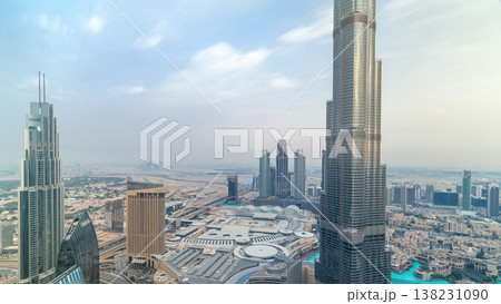 Panoramic skyline view of Dubai downtown with mall, fountains and Burj Khalifa aerial timelapse Panoramic skyline view of Dubai downtown with mall, fountains and Burj Khalifa aerial timelapse 138231090