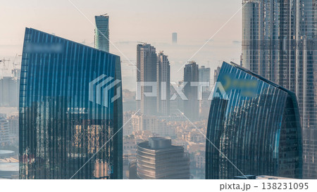 Dubai downtown during golden sunrise morning scene timelapse. Dubai downtown during golden sunrise morning scene timelapse. 138231095