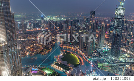 Amazing aerial view of Dubai downtown skyscrapers day to night timelapse, Dubai, United Arab Emirates 138231098
