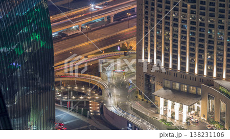 Dubai downtown street with busy traffic and skyscrapers around timelapse. Dubai downtown street with busy traffic and skyscrapers around timelapse. 138231106