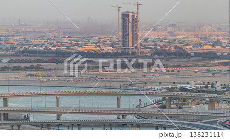 Construction and intersection near Dubai Creek Harbor aerial timelapse. Dubai - UAE. Construction and intersection near Dubai Creek Harbor aerial timelapse. Dubai - UAE. 138231114