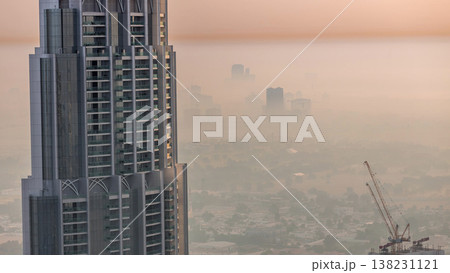 Aerial view of neighborhood Zabeel and Dubai creek with typical old and modern buildings morning timelapse. 138231121