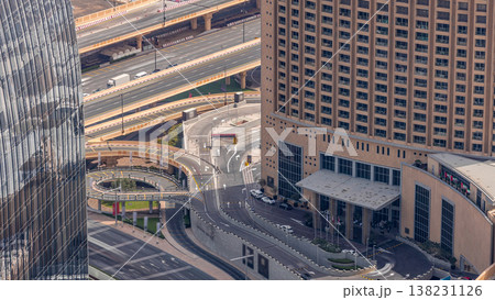 Dubai downtown street with busy traffic and skyscrapers around timelapse. Dubai downtown street with busy traffic and skyscrapers around timelapse. 138231126