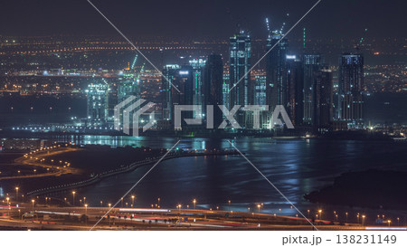 Construction of new skyscrapers in Dubai Creek Harbor aerial night timelapse. Dubai - UAE. 138231149