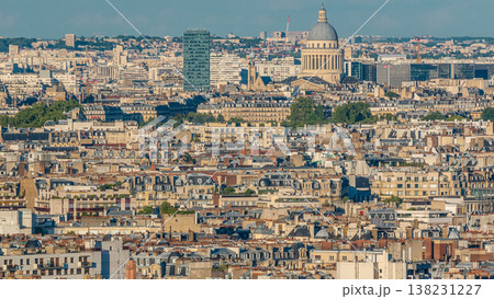 Aerial panorama above many houses rooftops in a Paris timelapse Aerial panorama above many houses rooftops in a Paris timelapse 138231227