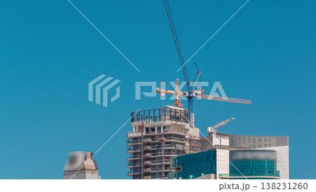 Construction of new modern skyscrapers in luxury Dubai city,United Arab Emirates 138231260