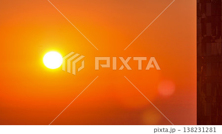 Sunrise close up view over Dubai skyline in the morning, aerial top view from downtown timelapse. Sunrise close up view over Dubai skyline in the morning, aerial top view from downtown timelapse. 138231281