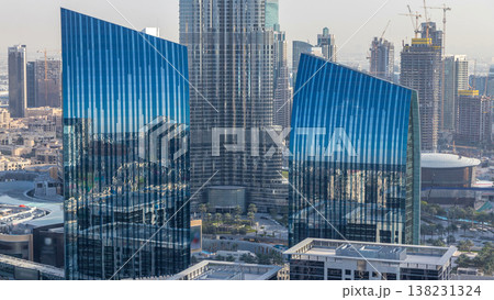Dubai downtown skyline at sunset timelapse with tallest building and Sheikh Zayed road traffic, UAE Dubai downtown skyline at sunset timelapse with tallest building and Sheikh Zayed road traffic, UAE 138231324