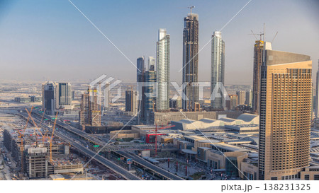 Dubai downtown skyline at sunset timelapse and road traffic near mall, UAE 138231325